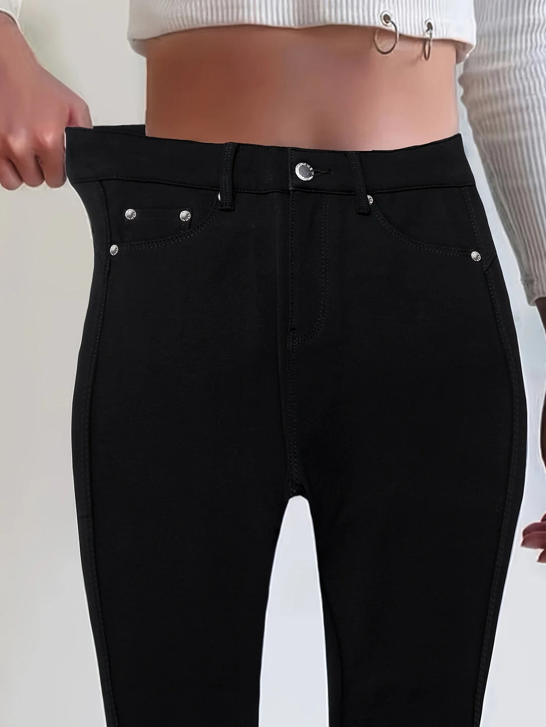 Spodnie jeansowe damskie skinny z wysokim stanem zapinane na guzik i zamek błyskawiczny