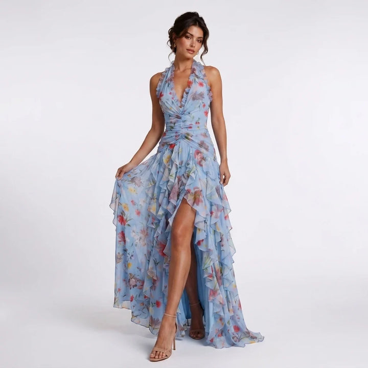 Sukienka maxi w kwiatowy print z dekoltem halter i asymetrycznym dołem na letnie okazje