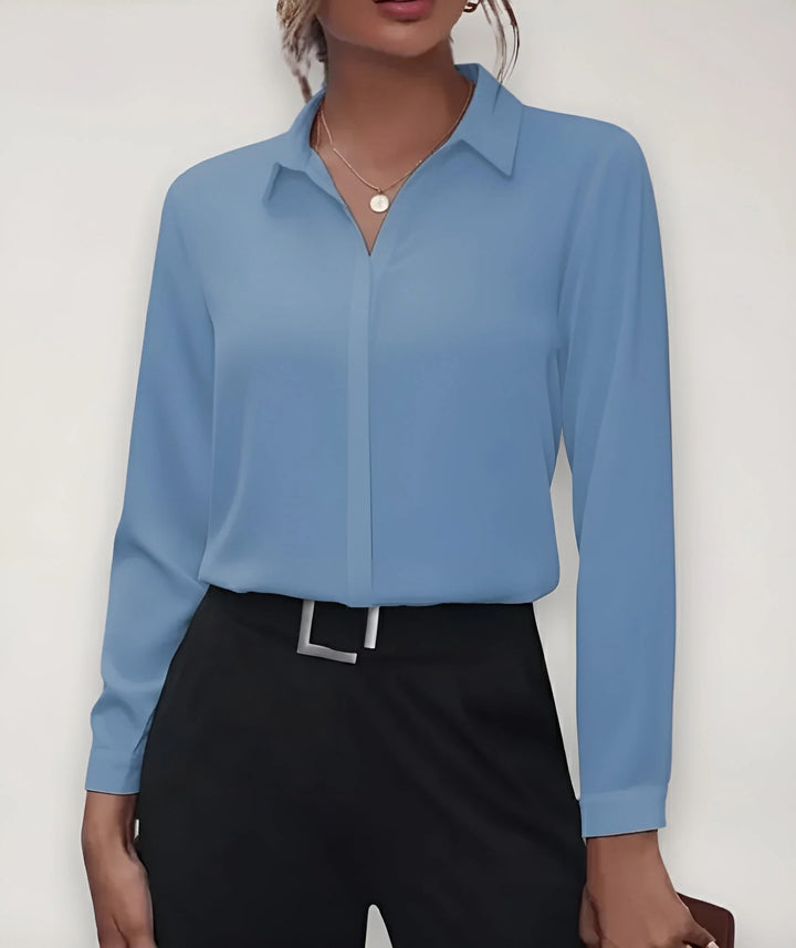 Elegancka bluzka zapinana na guziki z ustrukturyzowaną sylwetką do stylizacji biznesowych