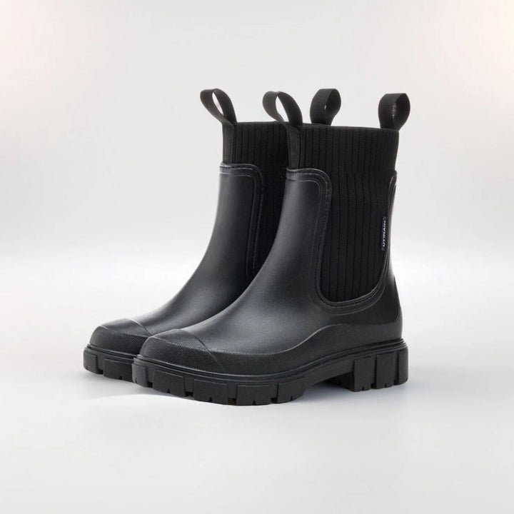 Detail shot of chunky tread sole on women's waterproof Chelsea boots for wet weather grip