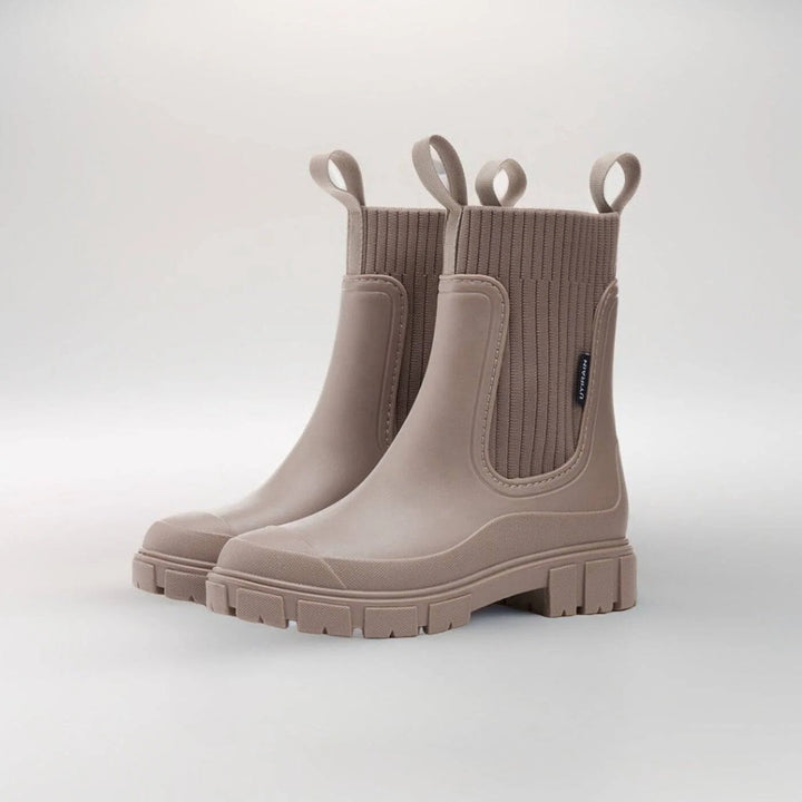 Women's Chelsea boots in alternative colourway displayed with smooth waterproof finish and pull tabs