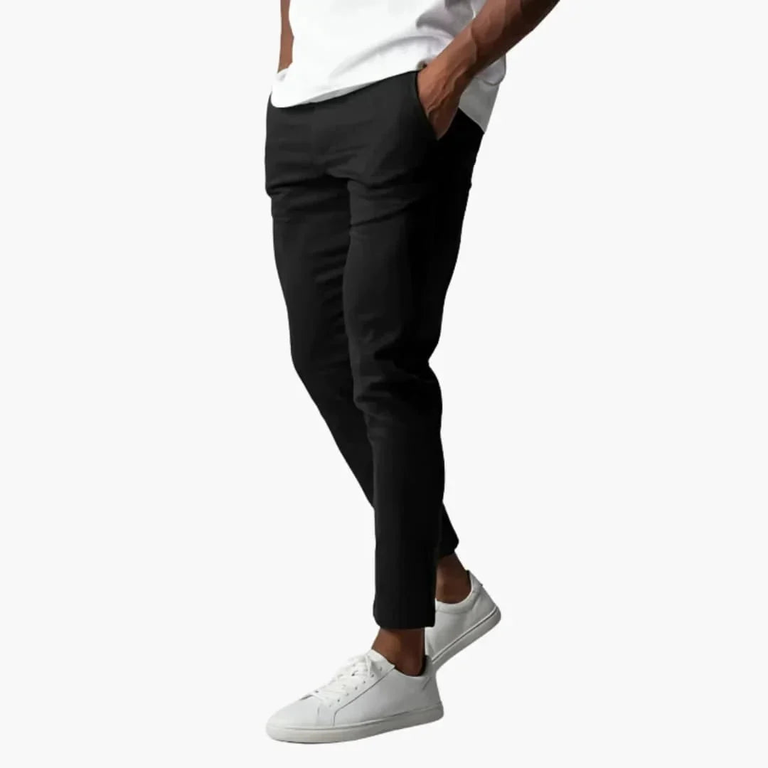 Czarne eleganckie spodnie męskie slim fit z elastyczną tkaniną i subtelnym designem