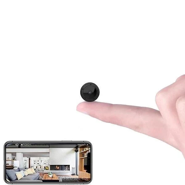 Mini kamera WiFi bezprzewodowa trzymana w dłoni z wyświetlonym podglądem monitoringu domowego na smartfonie