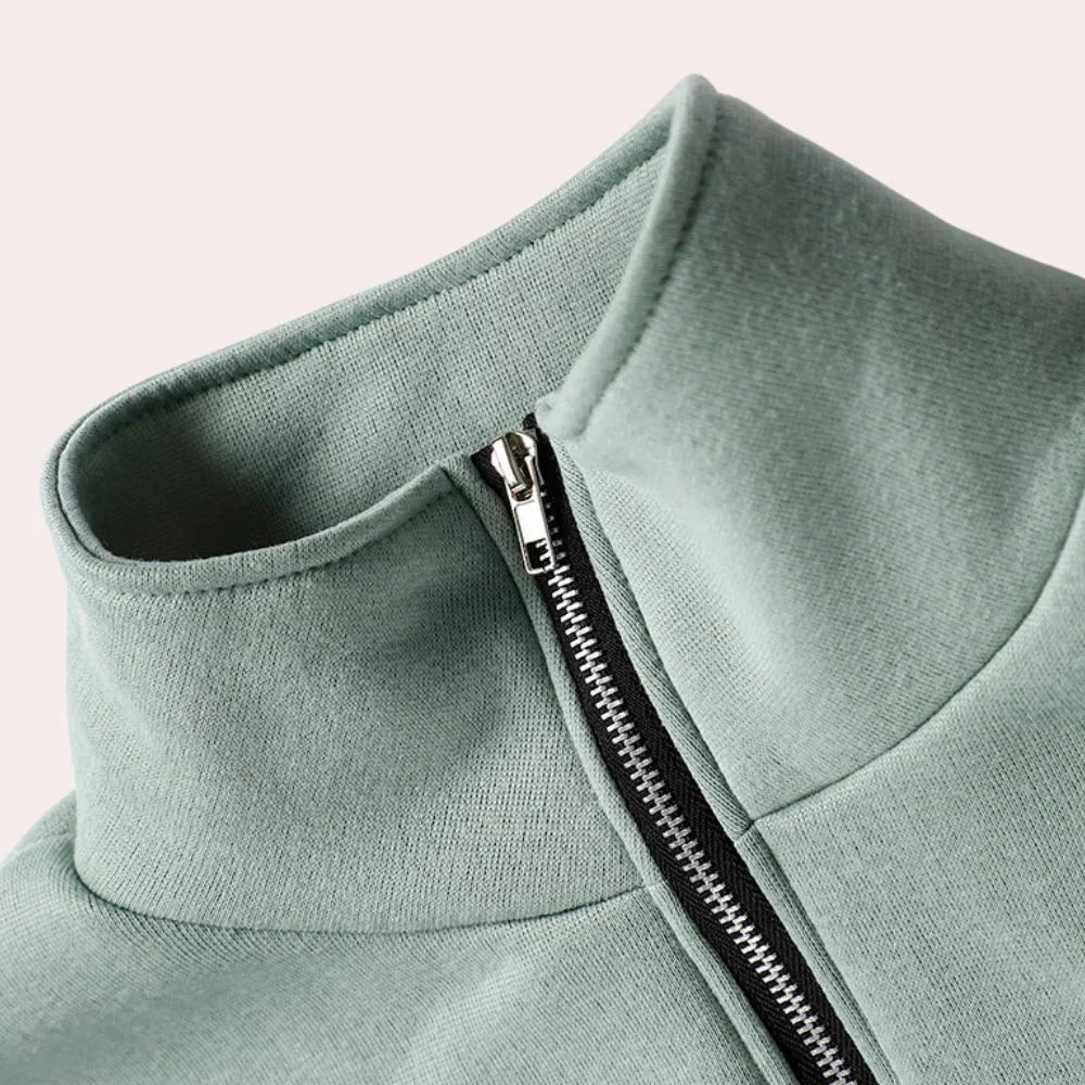 Dres damski dwuczęściowy o strukturze fleece z krótkim suwakiem i spodniami jogger w kolorze różowym