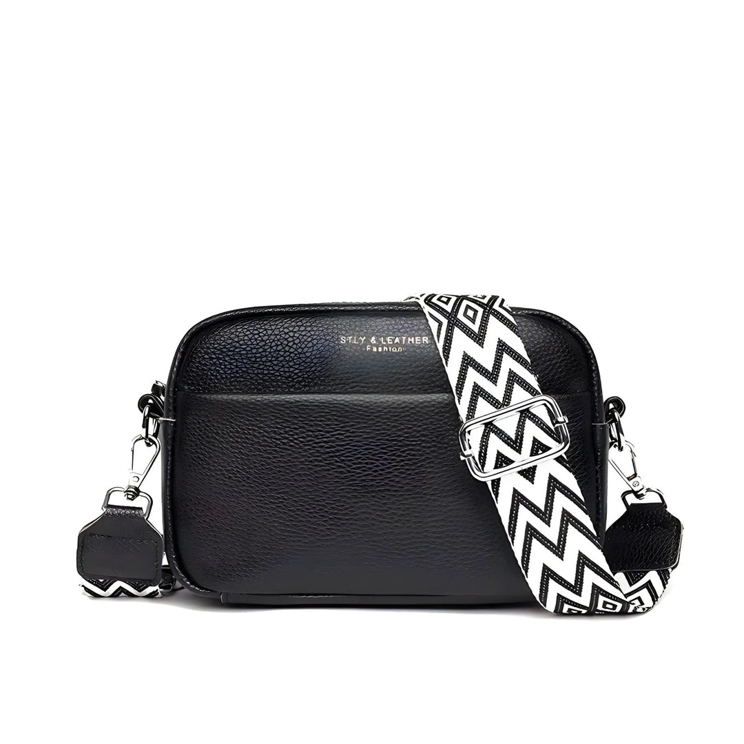 Brązowa torebka crossbody Leslie z miękkiej skóry z delikatną fakturą i metalowymi elementami