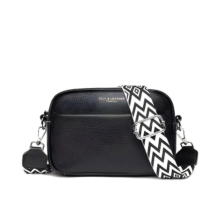 Brązowa torebka crossbody Leslie z miękkiej skóry z delikatną fakturą i metalowymi elementami