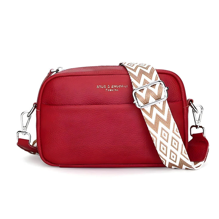 Elegancka torebka crossbody Leslie z metalowymi karabińczykami i geometrycznym paskiem