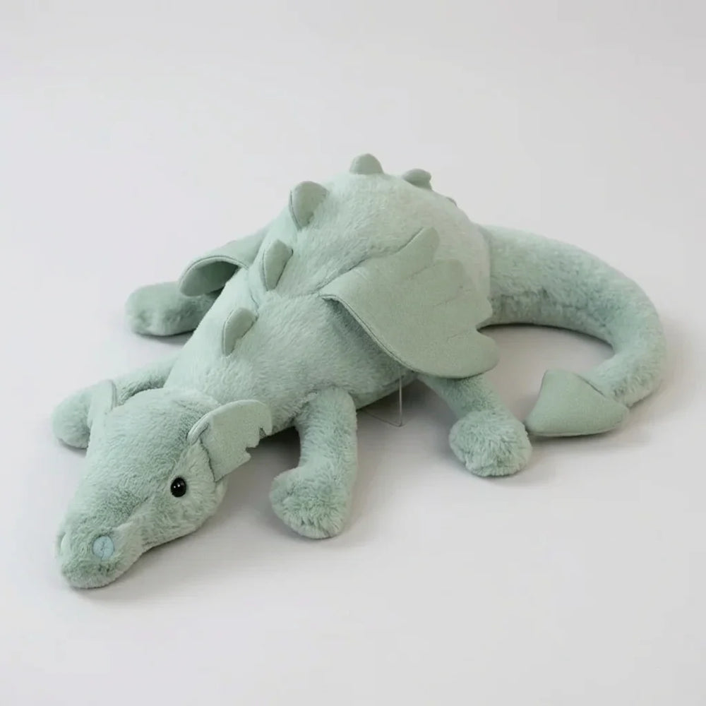 Pluszowa zabawka CuddleDragon smok z wypełnieniem trzymającym kształt, widoczna konstrukcja i wyraziste kolory maskotki