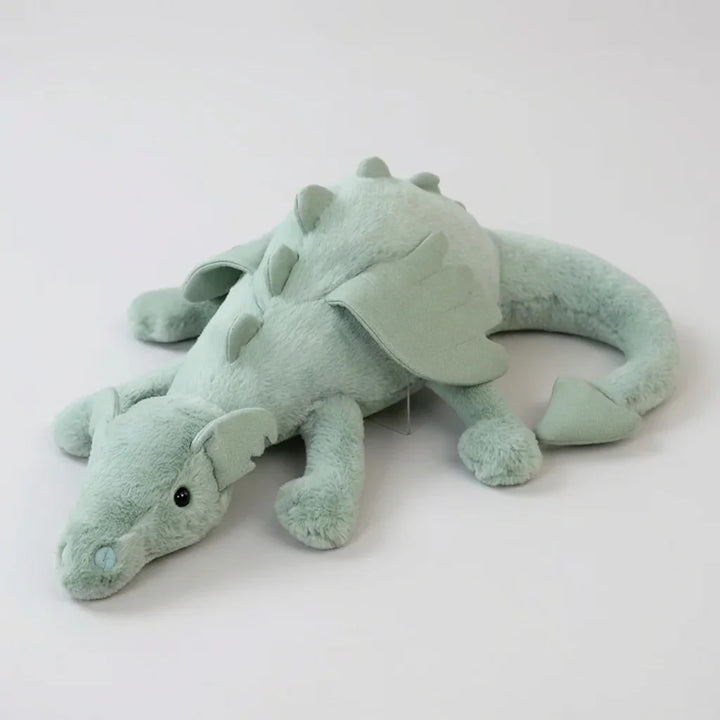 Pluszowa zabawka CuddleDragon smok z wypełnieniem trzymającym kształt, widoczna konstrukcja i wyraziste kolory maskotki