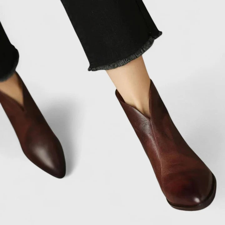 Women's ankle boots with streamlined silhouette and rear zip closure detail