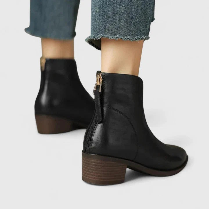 Women's ankle boots with refined pointed toe and stable low heel design