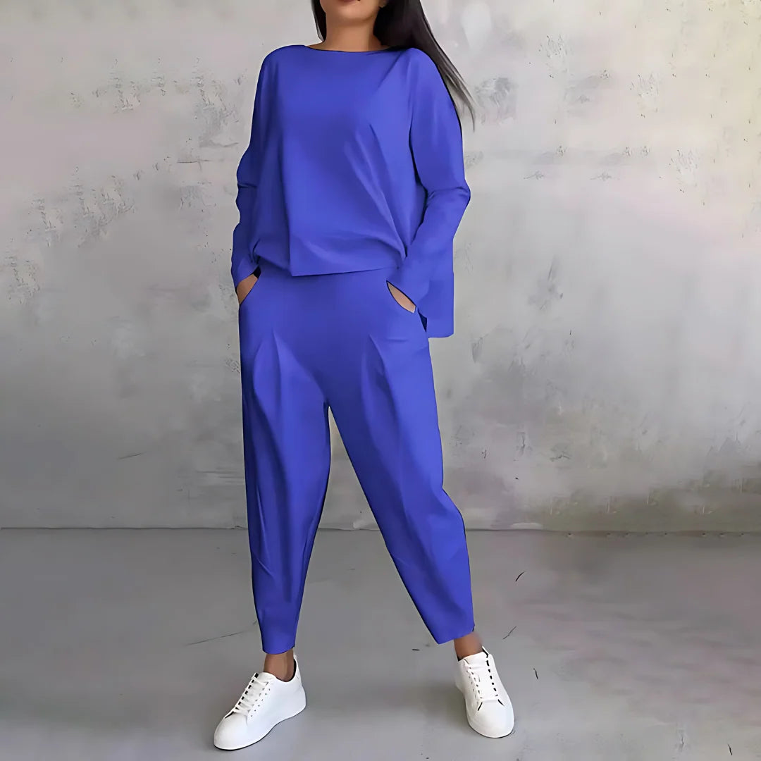 Komplet dresowy damski biały dres z gładką tkaniną i swobodnym krojem bluzy