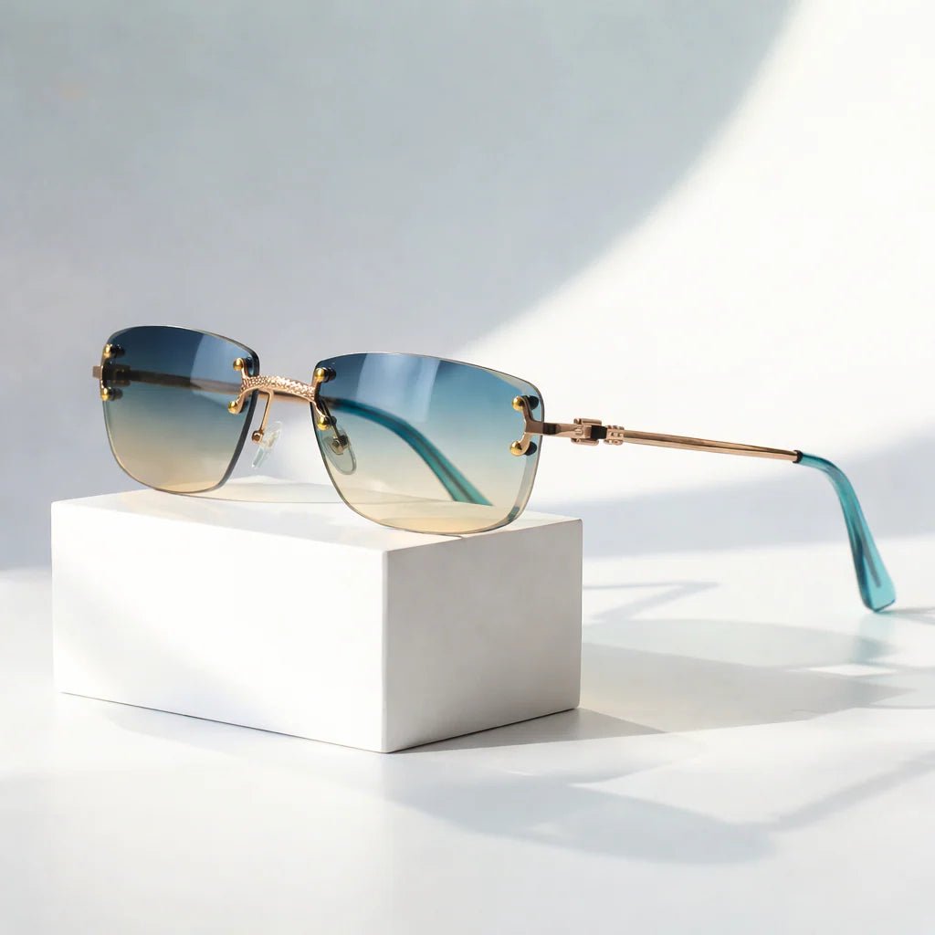 Okulary przeciwsłoneczne damskie bezramkowe w stylu aviator z metalowymi zausznikami w odcieniu złota