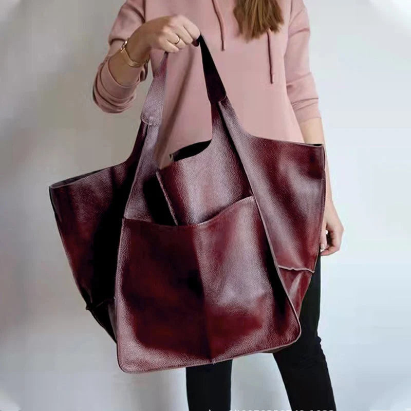 Męska torba skórzana vintage – pełna prezentacja torby w kolorze musztardowym na jasnym tle