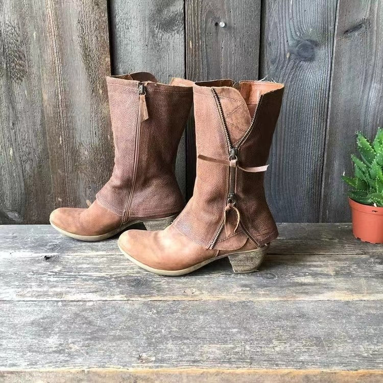 Side profile of women's mid-calf boots highlighting block heel and topstitching detail