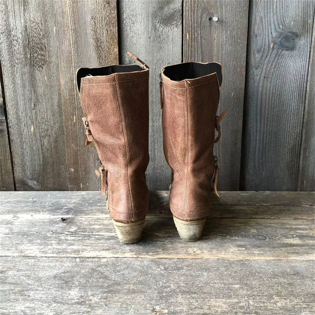 Women's mid-calf boots styled for autumn wear with visible panel construction and zip closure