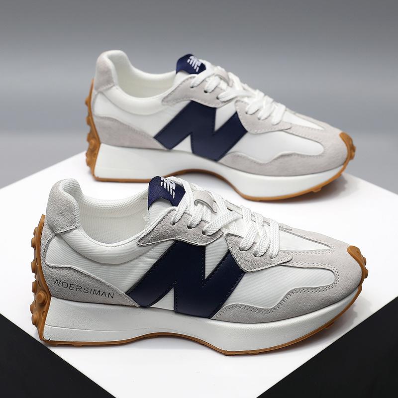 Wielokolorowe sneakersy damskie w żółto-pomarańczowej kolorystyce z granatowymi akcentami na stopie